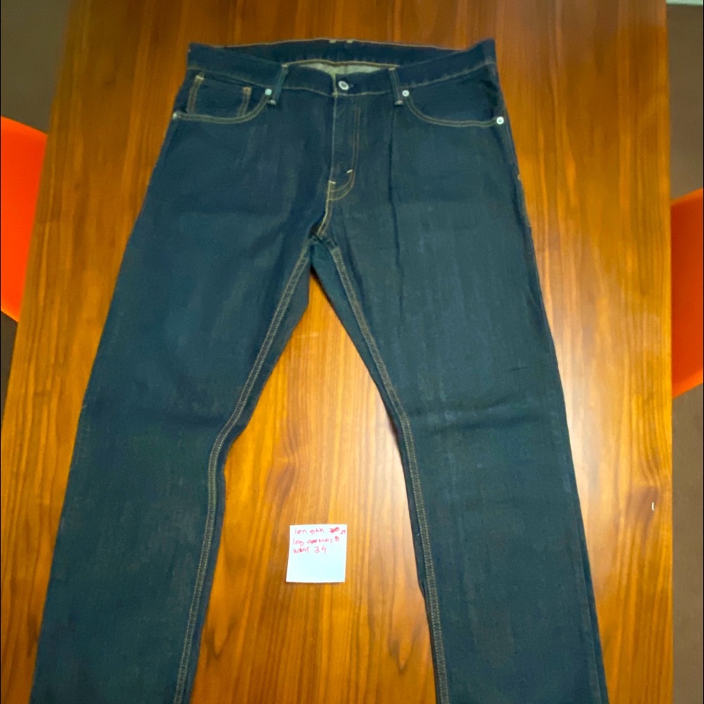 Levi’s jeans size 34 length 29” have been hemmed.